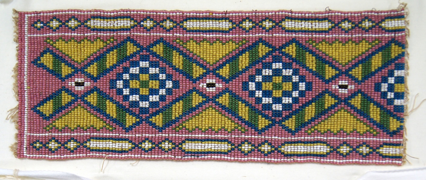 Image of Native American Loom-Woven Beaded Strap. Public domain, via Wikimedia Commons